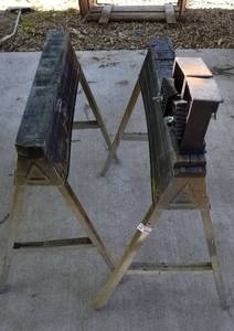 lot 4131 image: 2 folding saw horses and frame and parts for a third