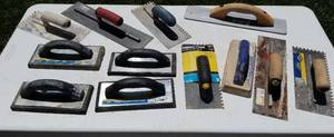 lot 5339 image: 12 trowels and floats