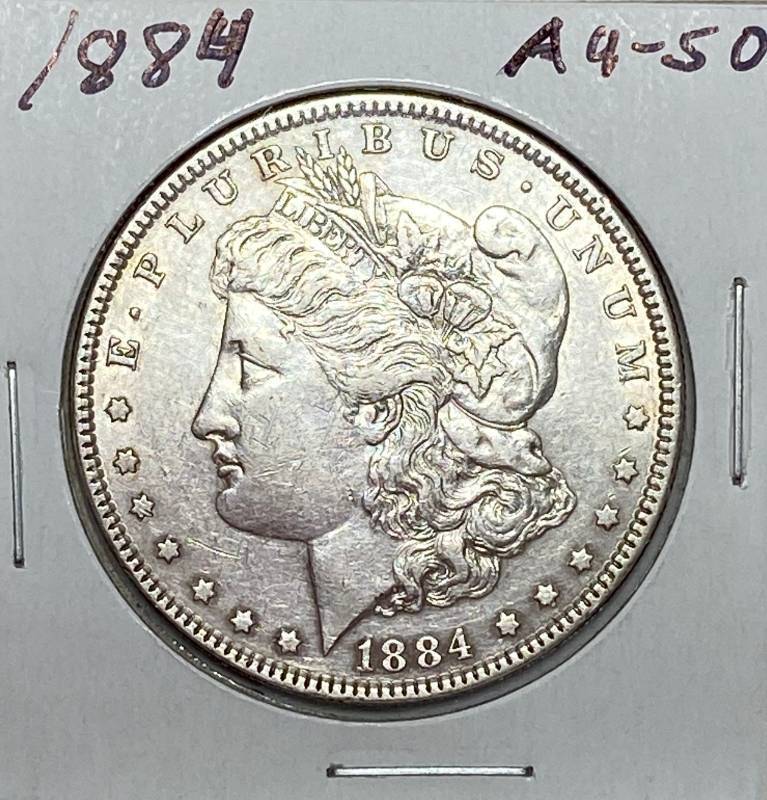 lot 6157 image: 1884 Morgan Silver Dollar