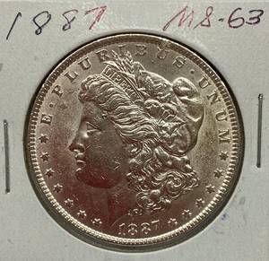 lot 1605 image: 1887 Morgan Silver Dollar