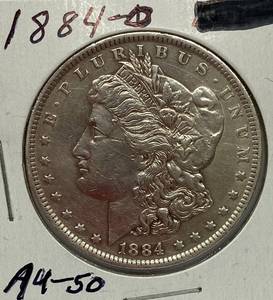 lot 1610 image: 1884-O Morgan Silver Dollar