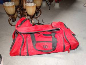 lot 3512 image: Red Duffel Bag with Wheels