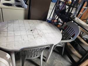 lot 3677 image: Plastic Patio Table with 2 Chairs