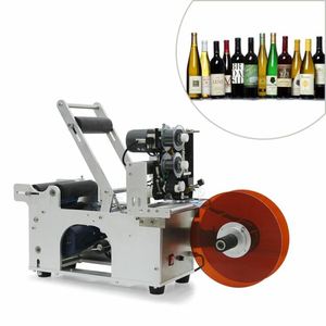 lot 1698 image: MT-50 semi-automatic round bottle labeling labeler machine heavy duty