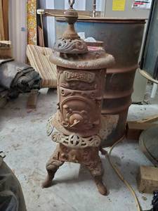 lot 160 image: Osage Oak Antique Wood Stove