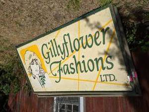 lot 1064 image: Large Sign Gillyflower Fashions LTD
