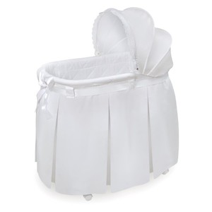 lot 3093 image: Badger Basket Wishes Oval Bassinet, Full Length Skirt, White Bedding