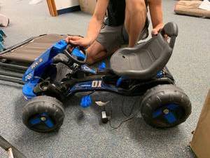 lot 3160 image: Huffy Flat Kart Battery Powered Ride On Kid Car Blue
