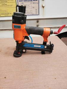 lot 6515 image: Central Pneumatic Plastic Cap Stapler
