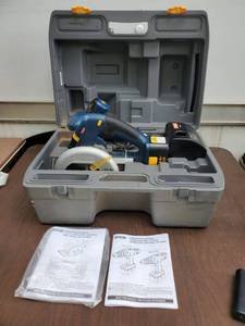 lot 6560 image: Ryobi Carpenter Kit - Cordless Drill Driver & Cordless Circular Saw wBattery Charger