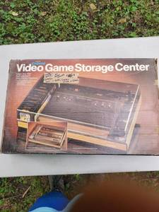 lot 6590 image: Atari Full System w games and Video Game Storage Center