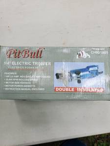 lot 6596 image: Pit Bull 14 inch Electric Trimmer