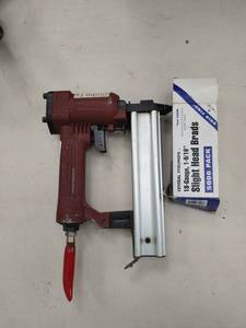 lot 6601 image: Central Pneumatic Air Brad Nailer w Hardware