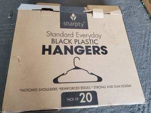 lot 826 image: Sharpty Standard Everday Black Plastic Hangers