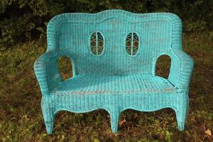 lot 1087 image: Antique Wicker Outdoor Sofa with Ornate Back Design