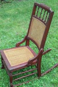 lot 1093 image: Antique Sewing Rocker with Cane Seat and Back