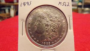 lot 6886 image: 1885 MORGAN SILVER DOLLAR - MS62