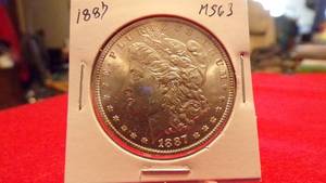 lot 6892 image: 1887 MORGAN DOLLAR MS63