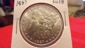 lot 6893 image: 1887 MORGAN DOLLAR MS58