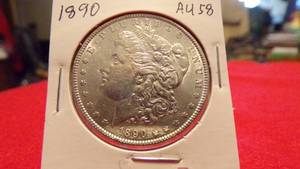 lot 6896 image: 1890 MORGAN SILVER DOLLAR - AU58