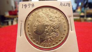 lot 6904 image: 1898 MORGAN DOLLAR AU58