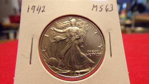 lot 6921 image: 1942 WALKING LIBERTY HALF MS63