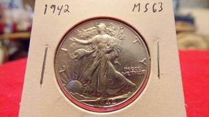 lot 6923 image: 1942 WALKING LIBERTY HALF MS63