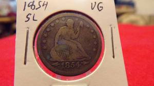 lot 6932 image: 1854 SEATED LIBERTY QUARTER VG