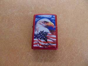 lot 1075 image: Red Zippo Lighter - with Eagle