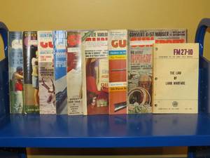 lot 7969 image: Lot of vintage Gun Sport magazines and Army Field Manual