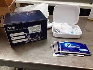 lot 1058 image: Water Flosser,JYSW Portable Water Pick Teeth Cleaner-500ML IPX7 Waterproof Electric Dental Oral Irrigator With Home Travel Bag and Teeth Whitening Strips,5-Mode Water Flossing with 3 Jet Tips