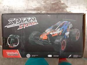 lot 1186 image: JEYPOD Remote Control Car, 2.4 GHZ High Speed Racing Car with 4 Batteries, Blue