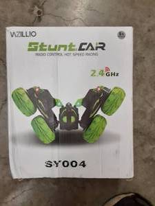 lot 1274 image: VAZILLIO Remote Control Stunt Car, 2.4GHz RC Road Racer Crawler Tumbler 360 Flip Rally Vehicle,Novelty Intellectual Toys for Kid Boys Girls (Orange)