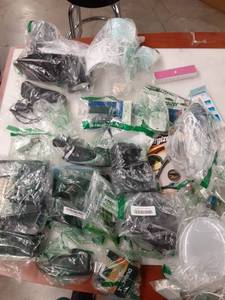 lot 1284 image: Large Lot of electronics including razors, my q garage system, mice, and more