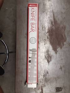 lot 1305 image: stainless steel magnetic knife bar by modern Innovations. 16 inch length fully magnetic surface