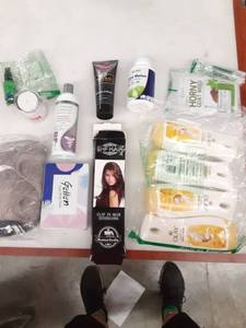 lot 1306 image: Miscellaneous personal care items such as olay lotion, hair extensions, eye cream and more