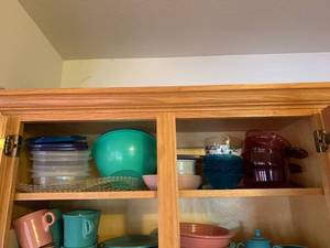 lot 6646 image: Top Shelf in Kitchen Cabinet Purple Pyrex Tupperware Rubbermaid