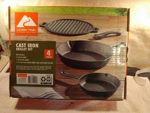 lot 6775 image: Ozark Trail 4 Piece Cast Iron Skillet Set
