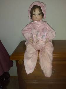 lot 8258 image: Doll With Ceramic Face And Hands Dressed In Night Clothes
