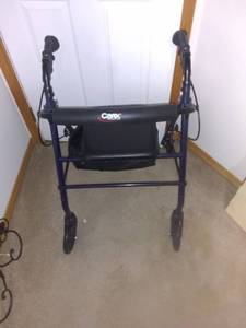 lot 8262 image: Carex Four Wheel Walker With Breaks And Seat