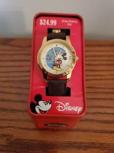lot 5903 image: Unique Rotating Dial Vintage Mickey Mouse Watch.in Metal Tin Case