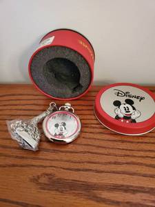 lot 5945 image: Mickey Mouse Chrome Pocket Watch. In Red Tin