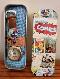lot 5947 image: Vintagr Walt Dianey Comics. Mickey Mouse Watch. Vol. 19 No. 28