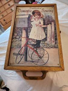 lot 7766 image: Domestic Sewing Case with Little Girl Sending A Letter To MAMA