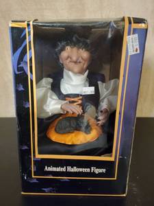 lot 8635 image: Animated Halloween Figure qoth Sound.Witch Petting her Cat