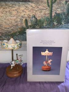 lot 8664 image: Legends of the Rose Musical Porcelain Carousel Figurine Location Pool Table