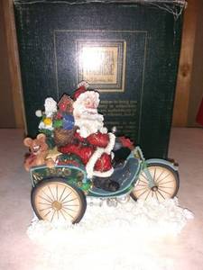 lot 8810 image: Horseless Carriage Santa on Bicycle 927, 5000