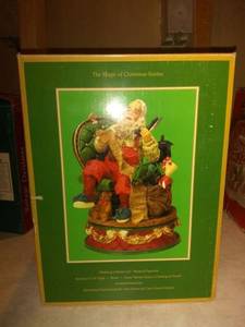 lot 8815 image: John Deere Santa Musical Figurine
