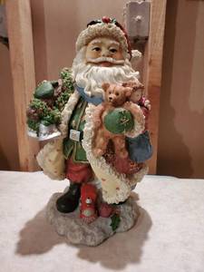 lot 8893 image: Hard Plastic Mantle Santa with Toys