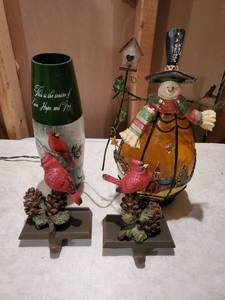 lot 8902 image: 2 Stocking Holders and Two Light Up Christmas Decorations - Cardinal Tree Topper and Snowman Light Up with 2 Matching Cast Iron Cardinal Stocking Holders